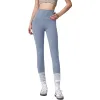 A woman wearing light blue high-waisted tight pants paired with white long socks and sports shoes can make her legs look longer Item Picture